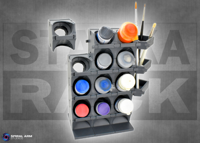 The StackaRack box provides enough parts to build a rack holding up to 12 pots of paint.